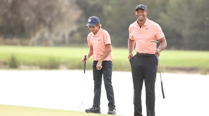 Tiger and Charlie Woods during Round 1 of the PNC Championship.